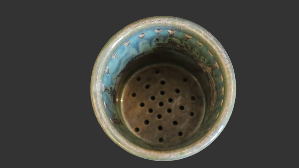 Håndrejet krukke i blågrøn glasur